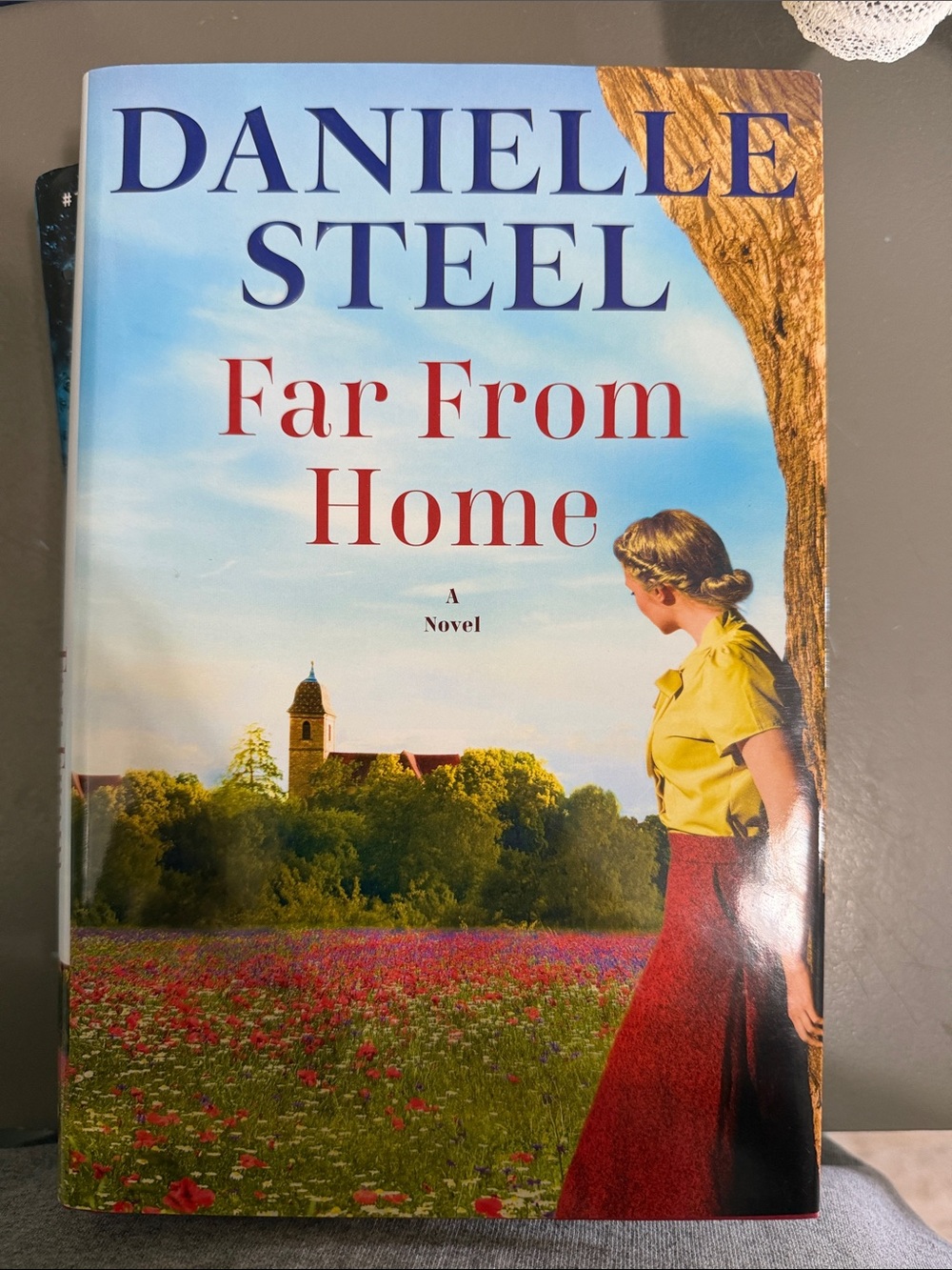 Far From Home Hardcover - Blue, Red, Yellow Cover